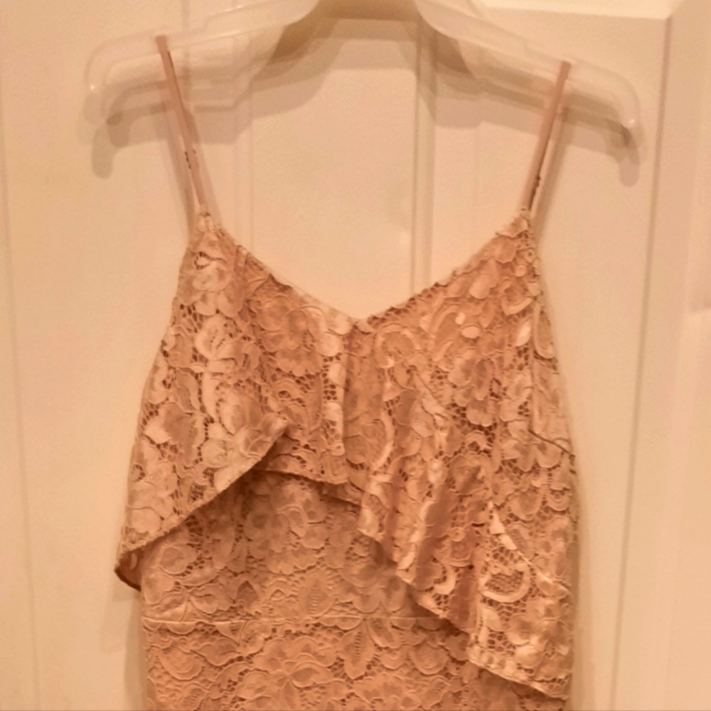 Dress with spaghetti string, lace, mid-calf leg, never worn with tags  attached.